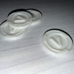 Pack de 4 mini pièces comme "V-Bucks"