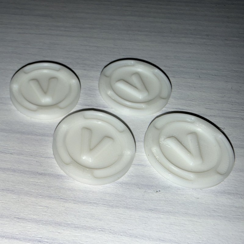 Pack de 4 mini pièces comme "V-Bucks"